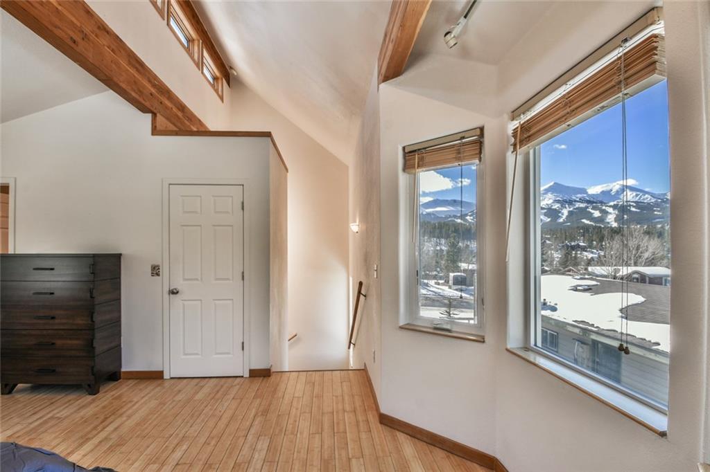 115 Reiling Road Breckenridge, CO 80424 - Photo 10 of 35 a view of an entryway with wooden floor and windows