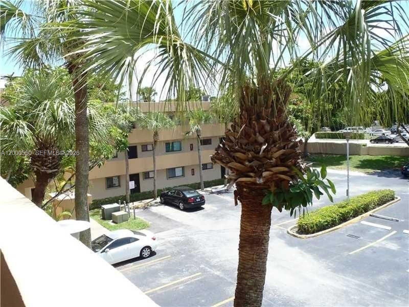 8415 Southwest 107th Avenue, Unit 238W Miami, FL 33173 - Photo 26 of 30 a view of a house with backyard and sitting area