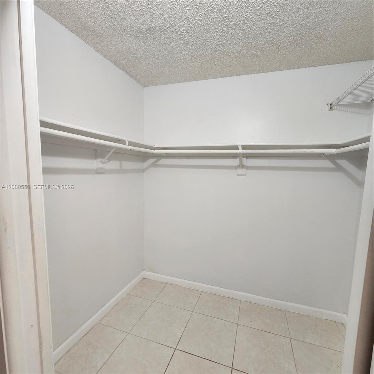 8415 Southwest 107th Avenue, Unit 238W Miami, FL 33173 - Photo 5 of 30 a view of an empty walk in closet