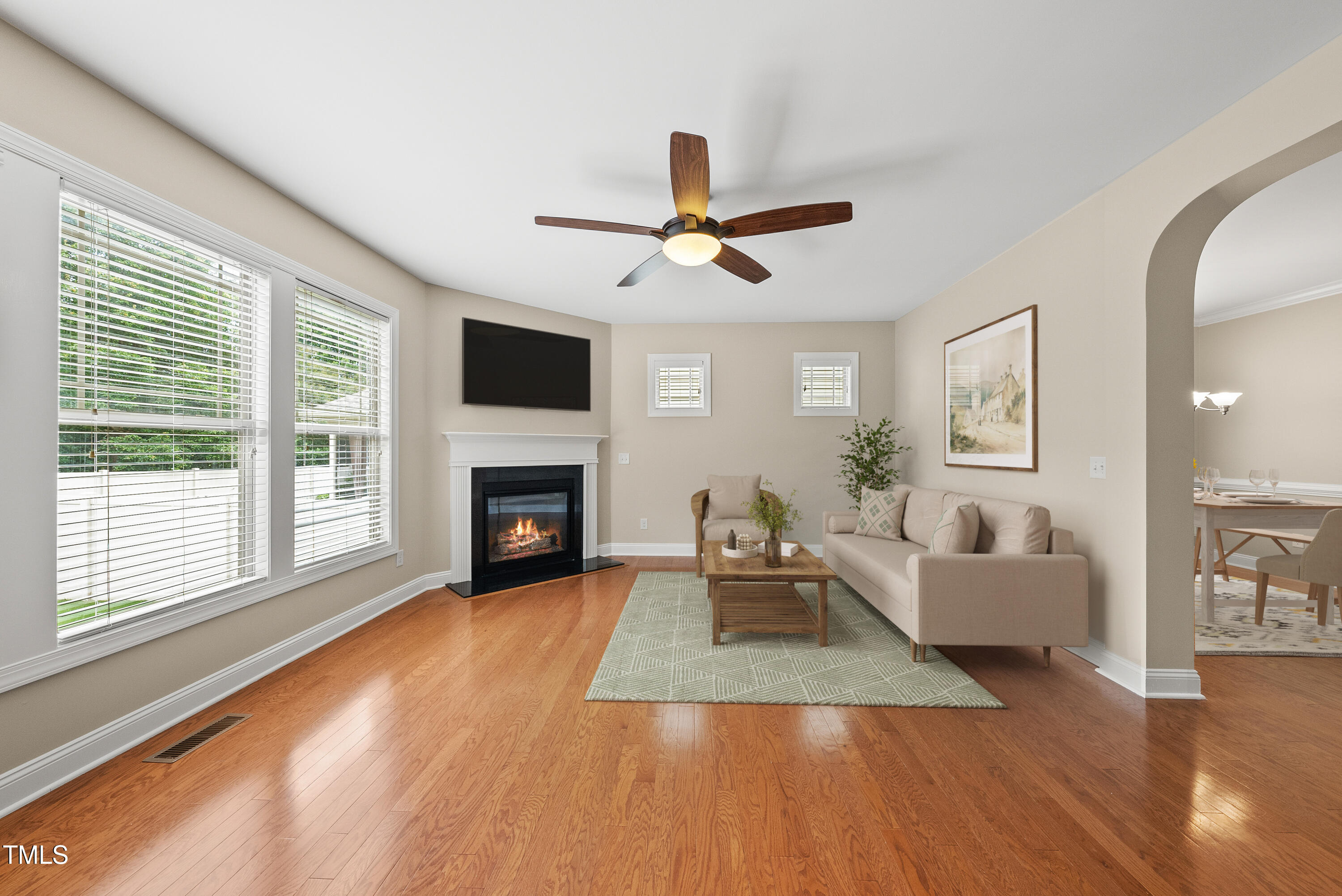 5120 Audreystone Drive Cary, NC 27518 - Photo 12 of 65 a living room with furniture fireplace and flat screen tv