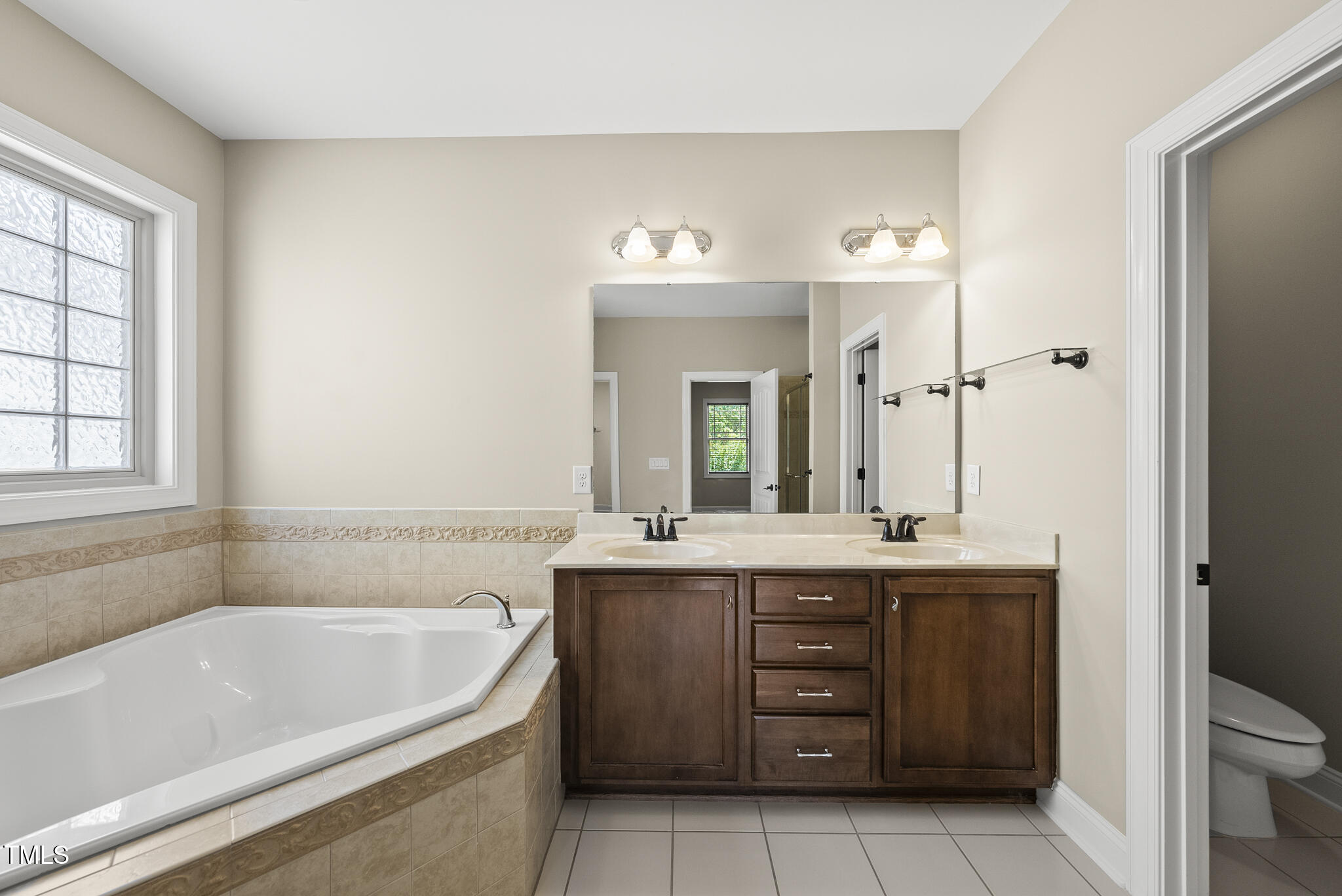 5120 Audreystone Drive Cary, NC 27518 - Photo 15 of 65 Primary Bathrooms