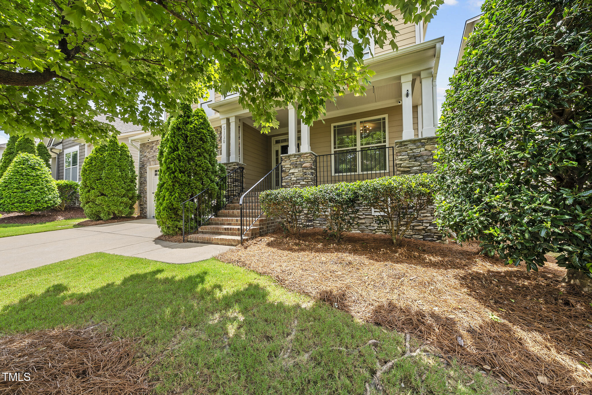 5120 Audreystone Drive Cary, NC 27518 - Photo 17 of 65 front view of a house with a yard