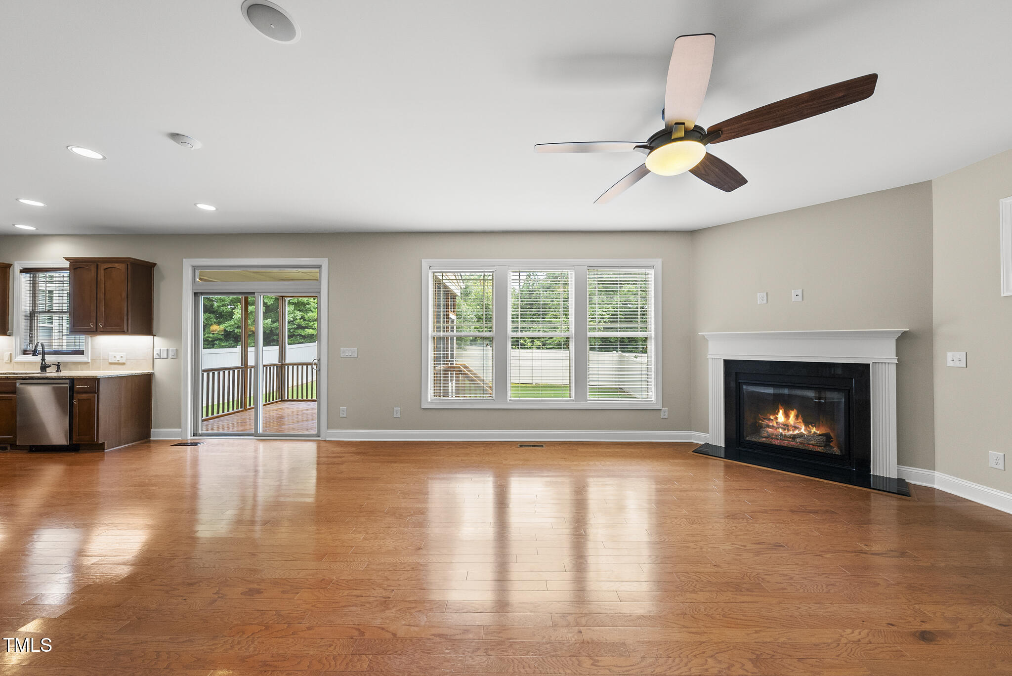 5120 Audreystone Drive Cary, NC 27518 - Photo 24 of 65 a view of a livingroom with a fireplace and a window