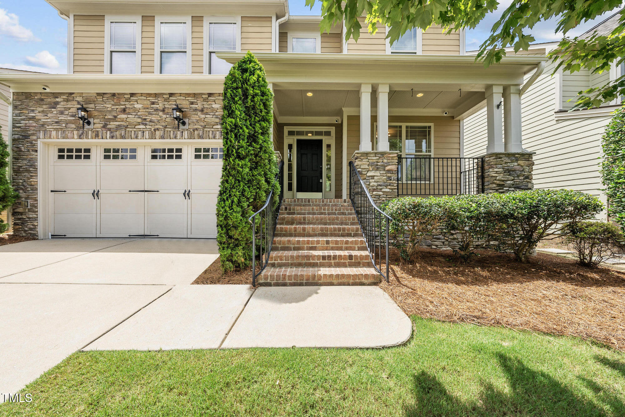 5120 Audreystone Drive Cary, NC 27518 - Photo 2 of 65 a view of a building with pathway