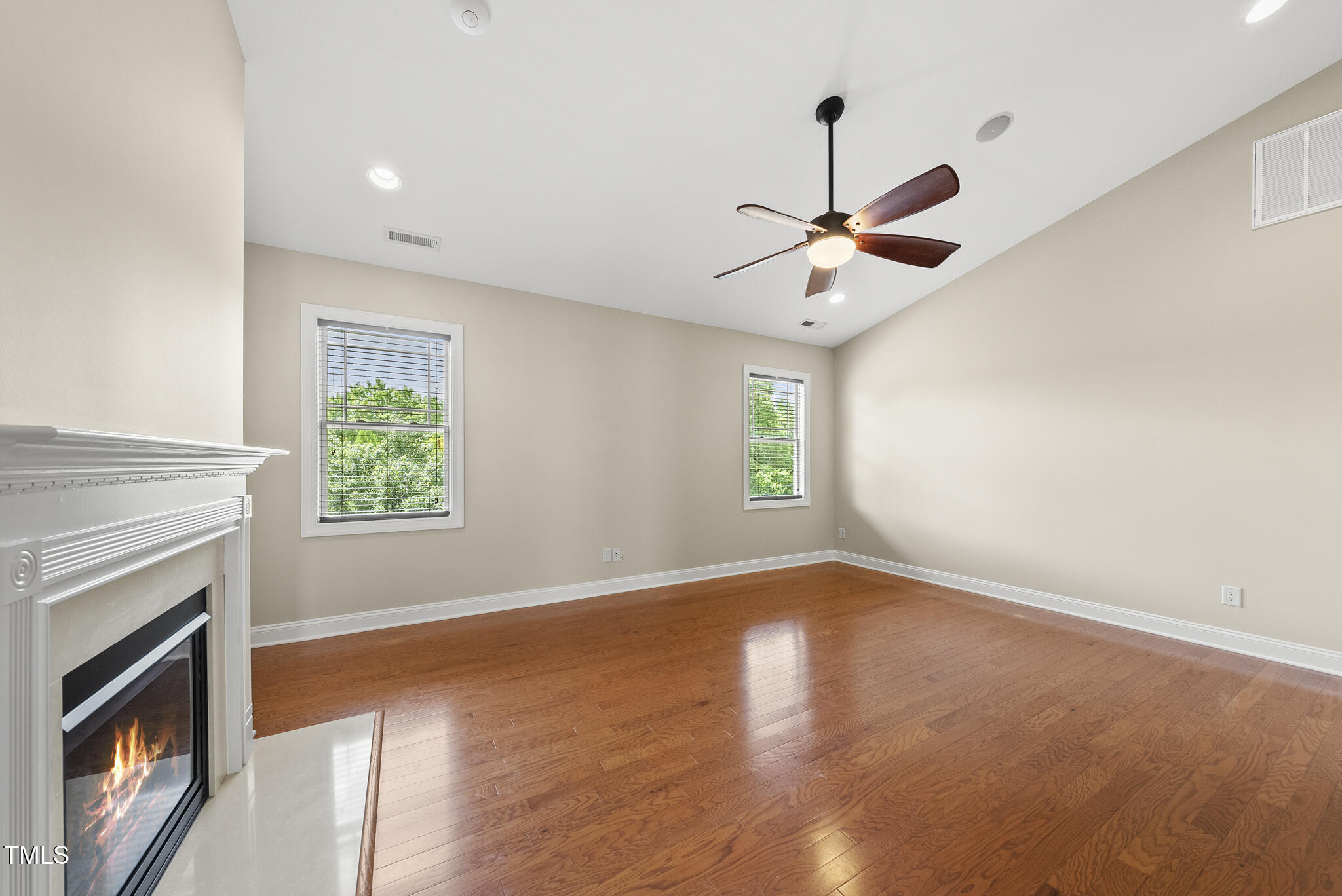 5120 Audreystone Drive Cary, NC 27518 - Photo 34 of 65 wooden floor in an empty room with a window