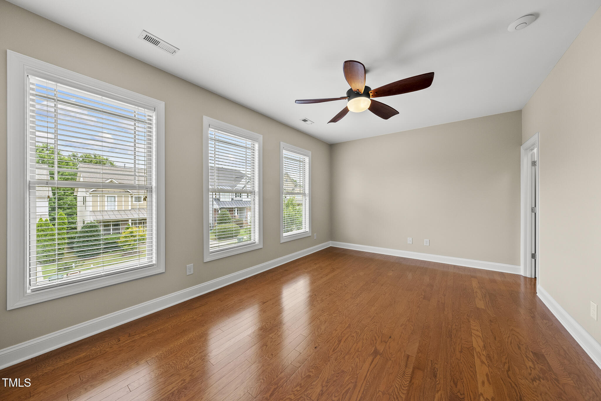 5120 Audreystone Drive Cary, NC 27518 - Photo 38 of 65 a view of room window and wooden floor