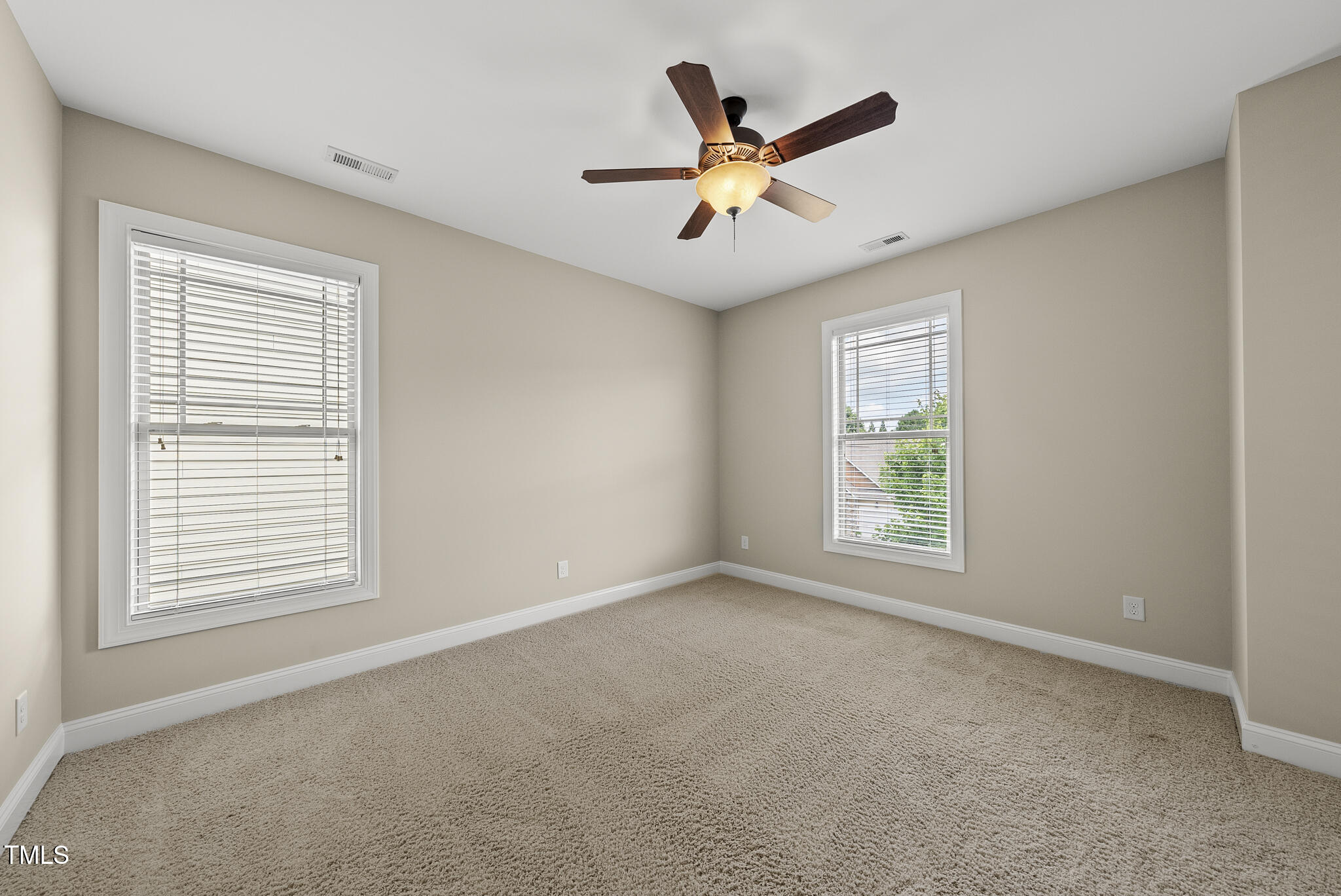 5120 Audreystone Drive Cary, NC 27518 - Photo 42 of 65 a view of an empty room with a window