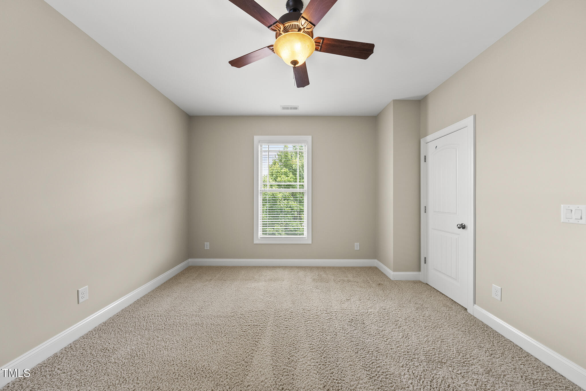 5120 Audreystone Drive Cary, NC 27518 - Photo 43 of 65 a view of room with window and ceiling fan
