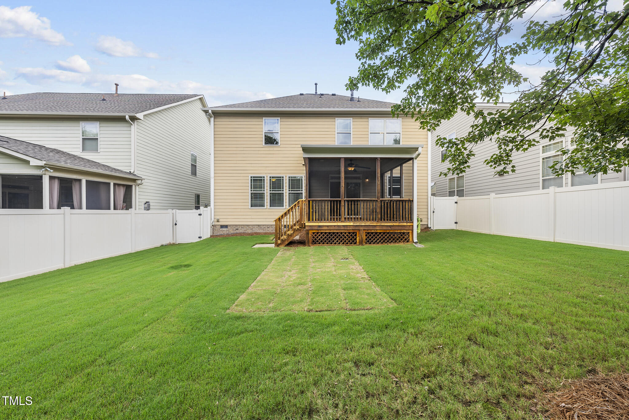 5120 Audreystone Drive Cary, NC 27518 - Photo 50 of 65 a view of a house with backyard and a garden