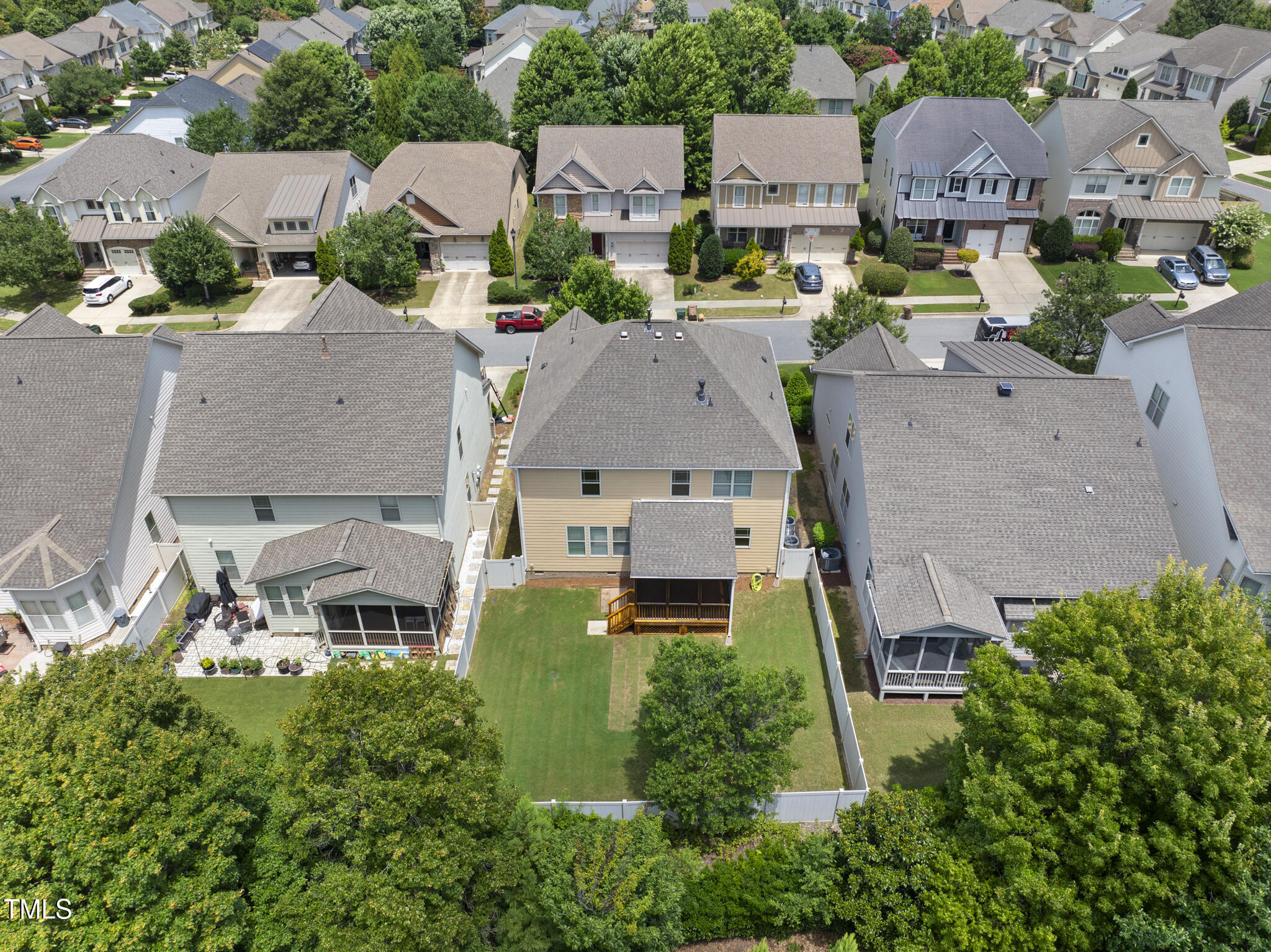 5120 Audreystone Drive Cary, NC 27518 - Photo 53 of 65 an aerial view of multiple houses with yard