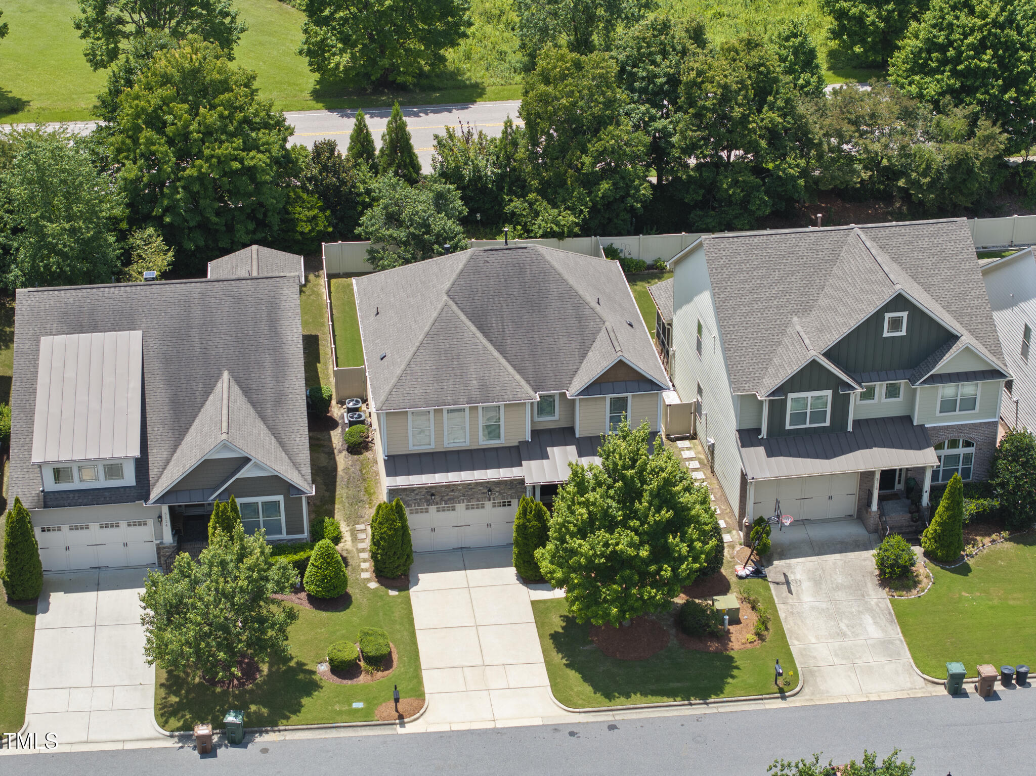 5120 Audreystone Drive Cary, NC 27518 - Photo 56 of 65 an aerial view of a house with a garden