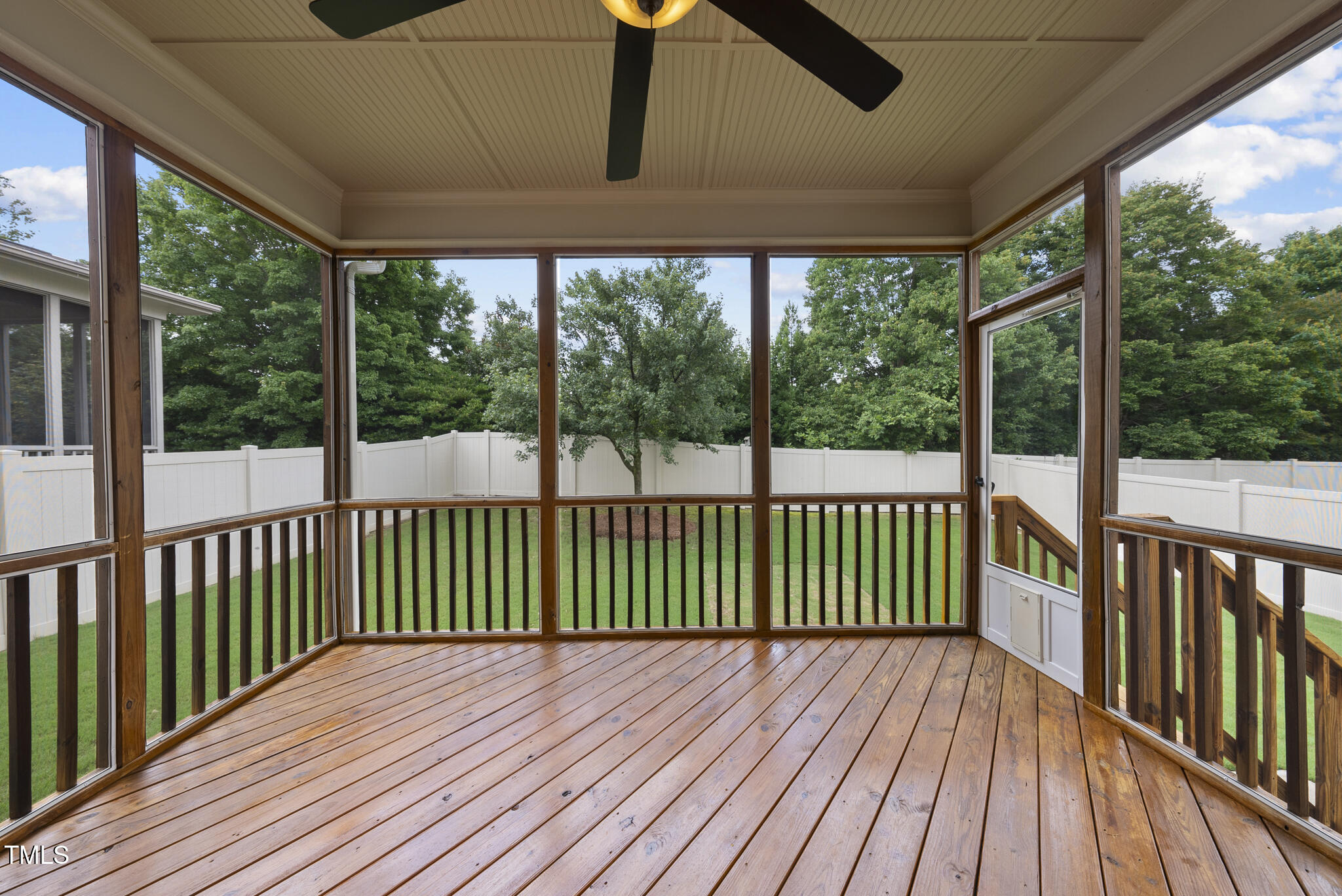 5120 Audreystone Drive Cary, NC 27518 - Photo 5 of 65 a view of a wooden deck with a yard