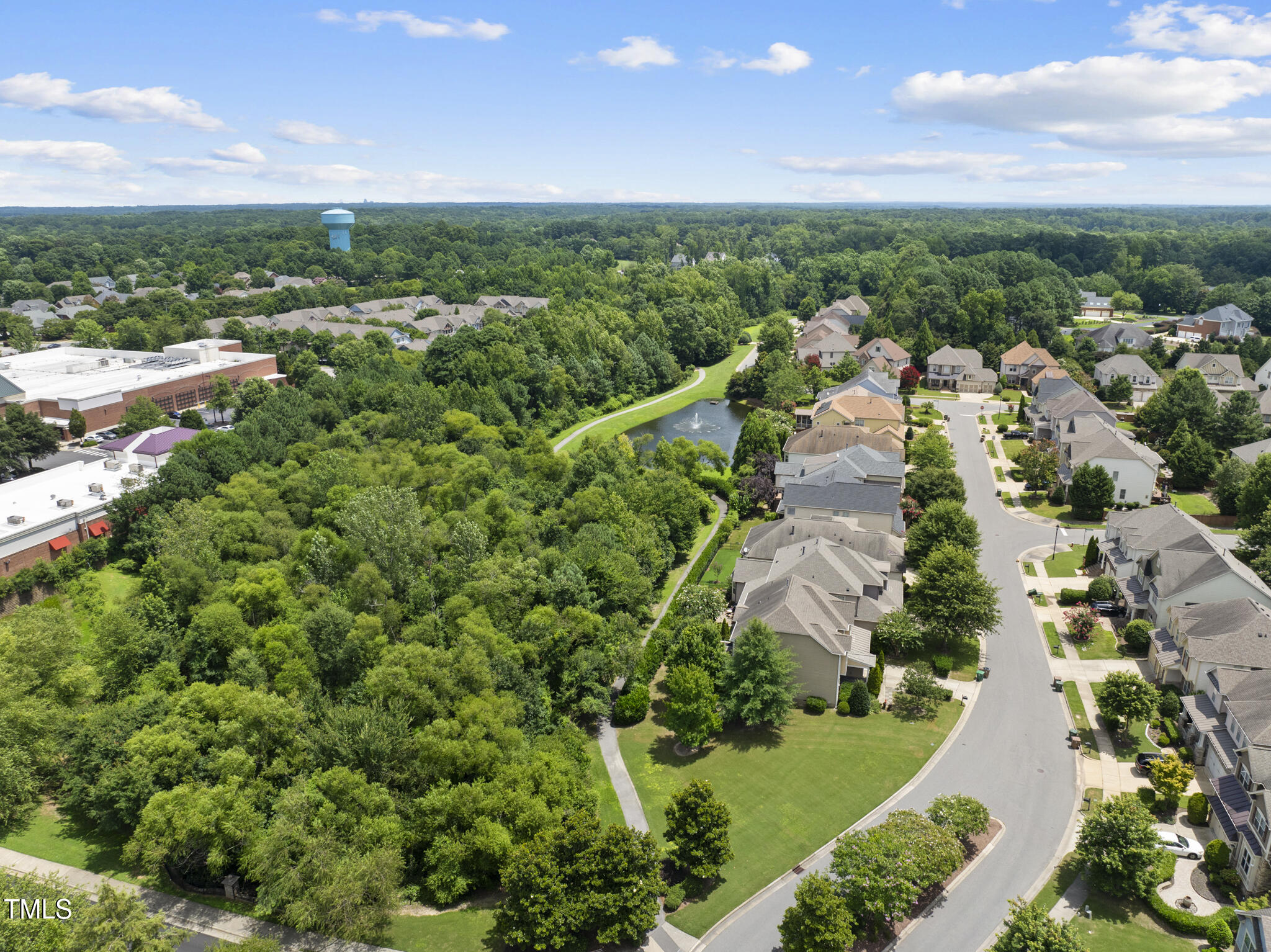 5120 Audreystone Drive Cary, NC 27518 - Photo 59 of 65 an aerial view of residential houses with outdoor space and trees