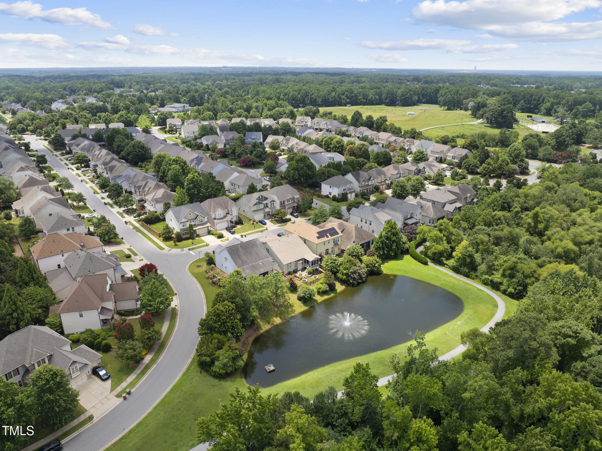 5120 Audreystone Drive Cary, NC 27518 - Photo 61 of 65 an aerial view of residential houses with outdoor space and trees