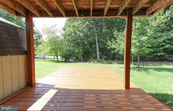 a view of a backyard of the house