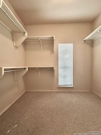 a view of a room with rack on the wall