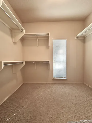 a view of a room with rack on the wall