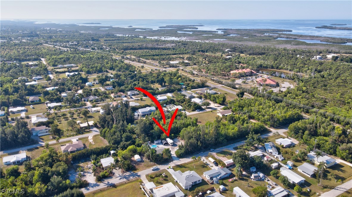 5887 Kingfish Road Bokeelia, FL 33922 - Photo 31 of 34 an aerial view of a city