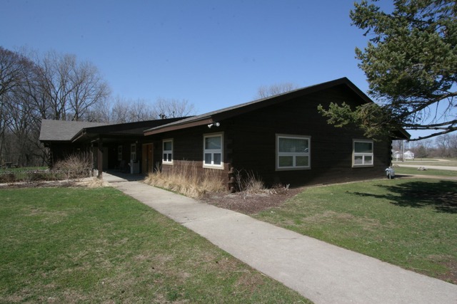 42-w635 Kedeka Road Sugar Grove, IL 60554 - Photo 5 of 25 a front view of a house with a yard and garage