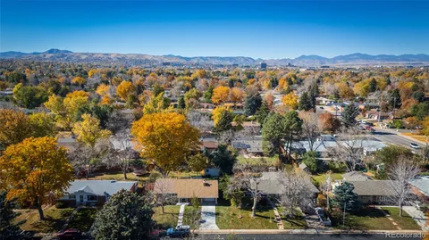 an aerial view of residential building and trees