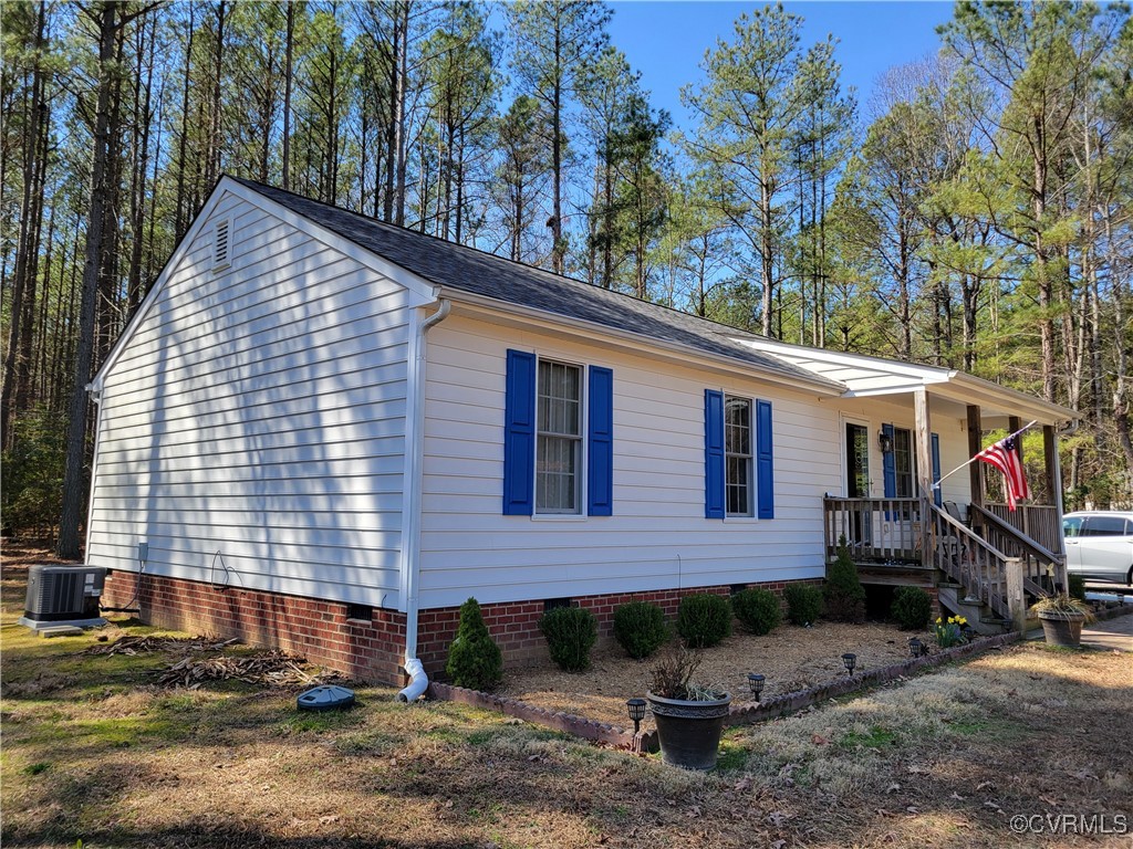2683 Beulah Church Road St. Stephens Church, VA 23148 - Photo 5 of 23 View of home's exterior with crawl space, covered