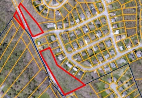 a room with a bed and a book shelf