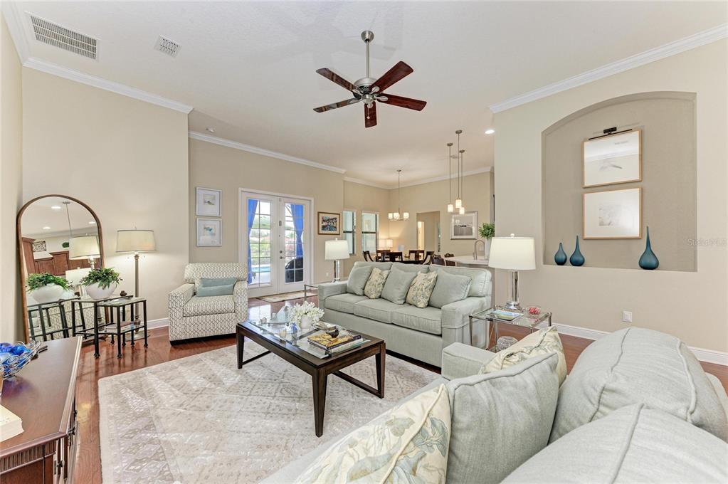 302 Cockle Shell Loop Apollo Beach, FL 33572 - Photo 22 of 75 a living room with furniture and a window