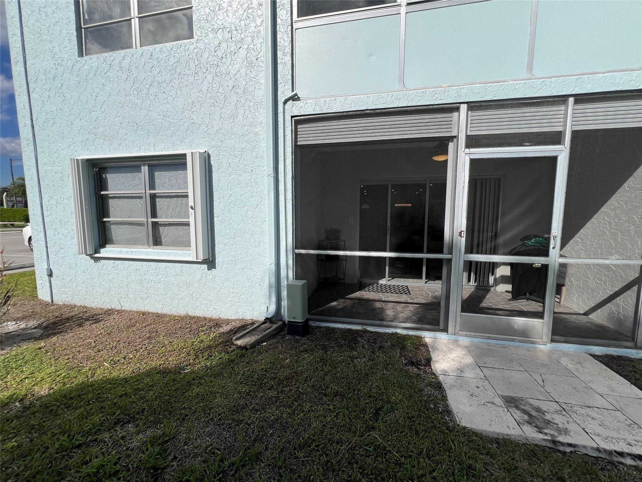 9780 Marina Boulevard, Unit 415 Boca Raton, FL 33428 - Photo 3 of 39 a view of outdoor space and yard