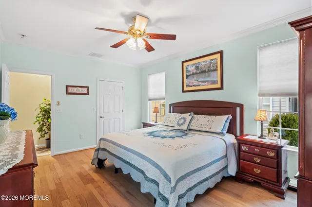 a bedroom with a bed and a table