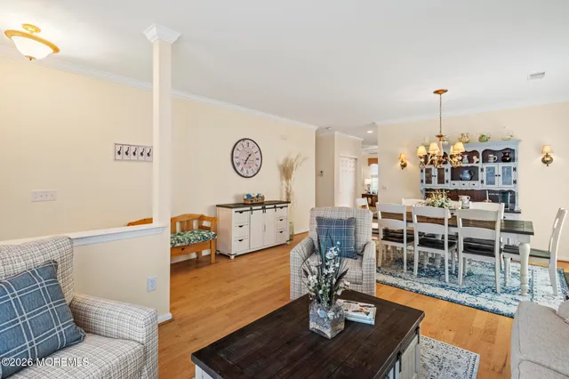 a living room with furniture and a table