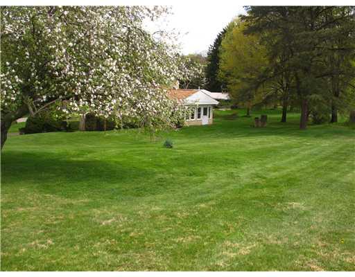 2730 Clearview Road Allison Park, PA 15101 - Photo 5 of 12 Exterior Back. Lovely, extremely private backyard with flowering trees