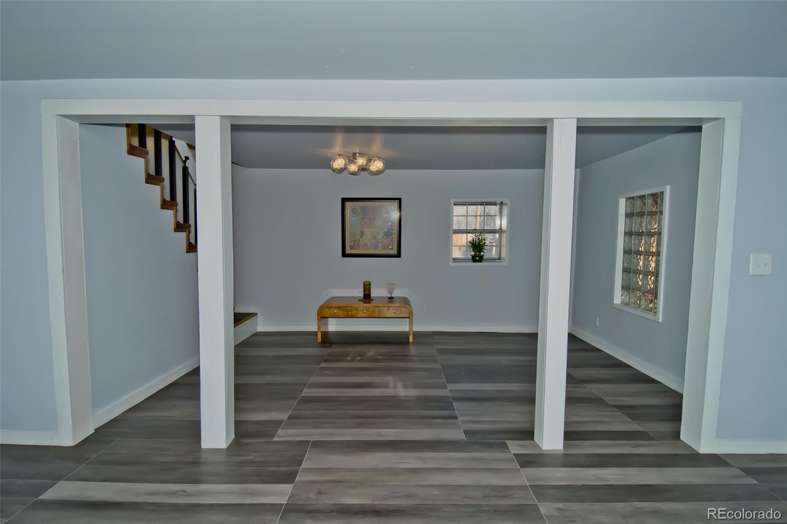 355 9th Street Saguache, CO 81149 - Photo 18 of 42 a living room with furniture and a potted plant