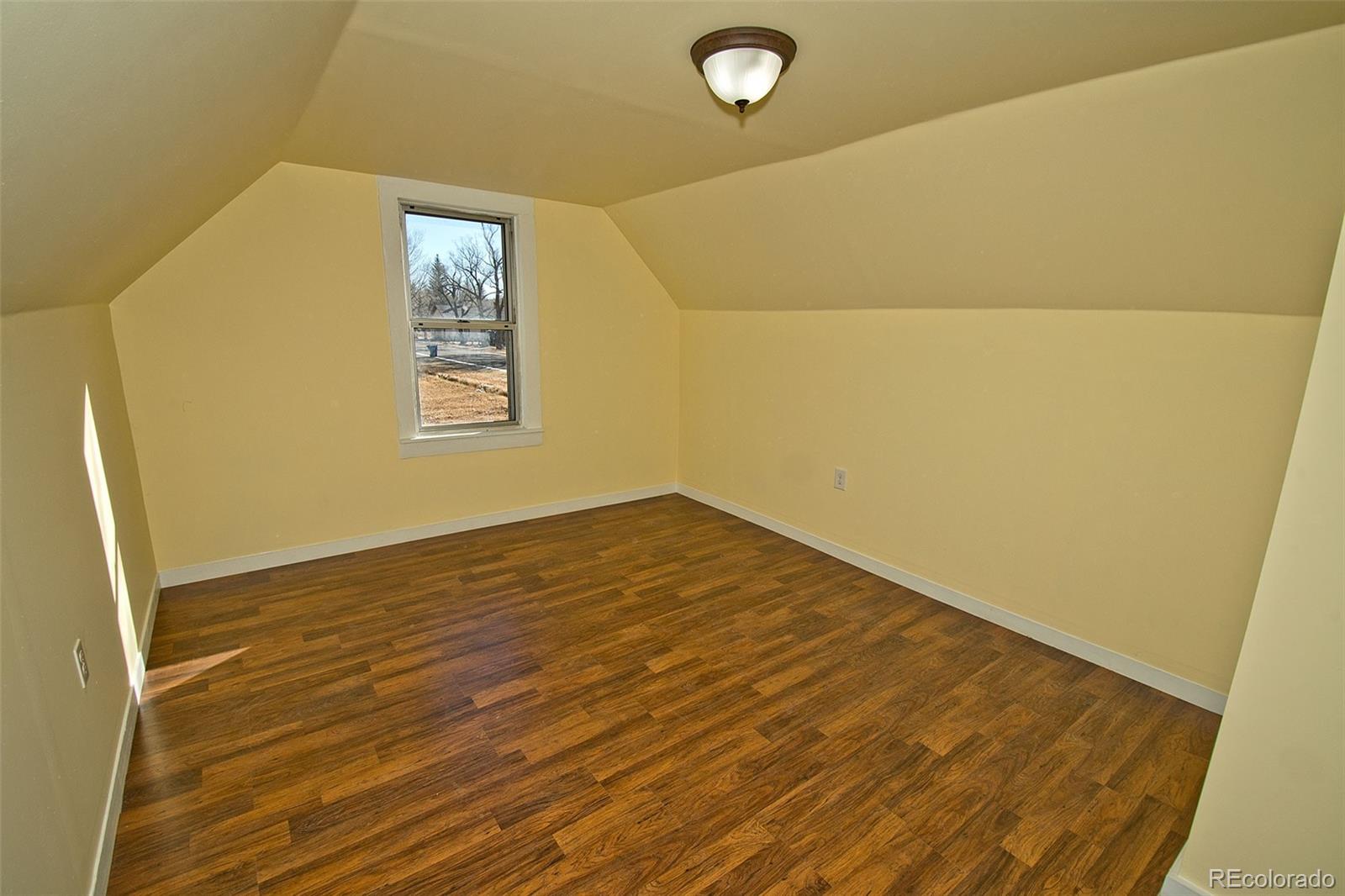 355 9th Street Saguache, CO 81149 - Photo 33 of 42 a view of empty room with wooden floor