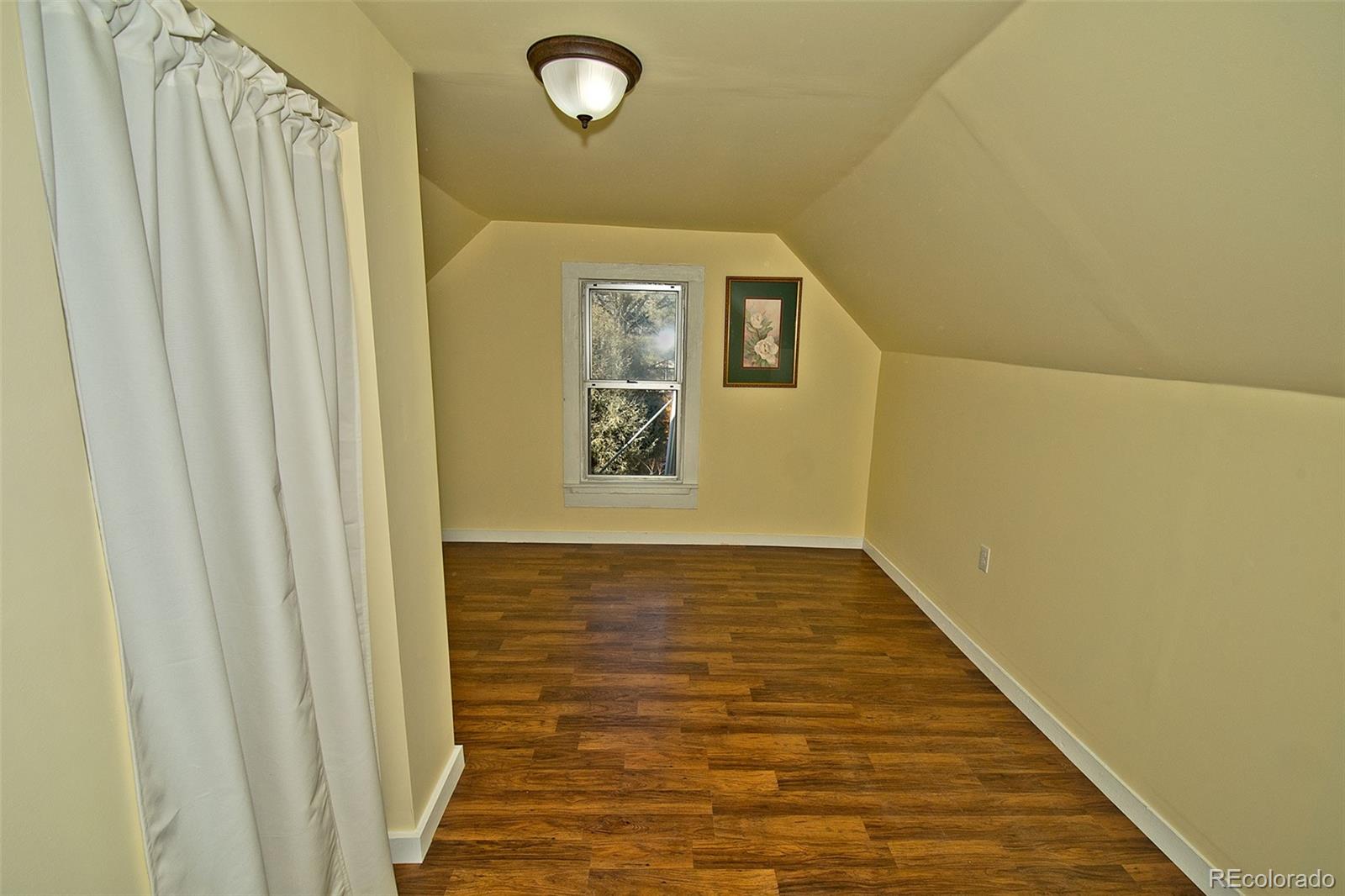 355 9th Street Saguache, CO 81149 - Photo 34 of 42 a view of hallway with wooden floor