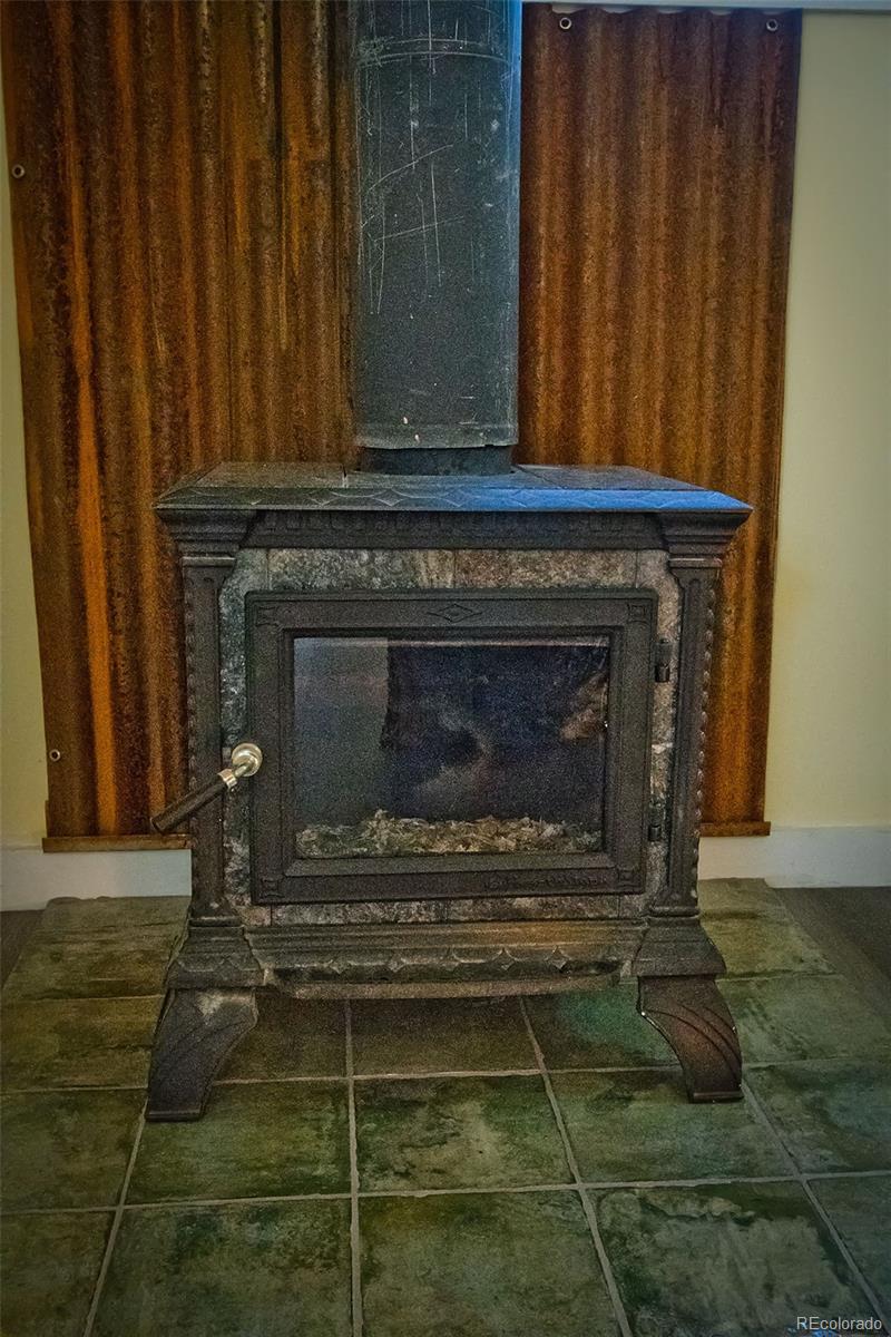 355 9th Street Saguache, CO 81149 - Photo 39 of 42 a stove top oven sitting inside of a kitchen