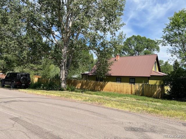 355 9th Street Saguache, CO 81149 - Photo 9 of 42 a view of a house with a yard and tree s