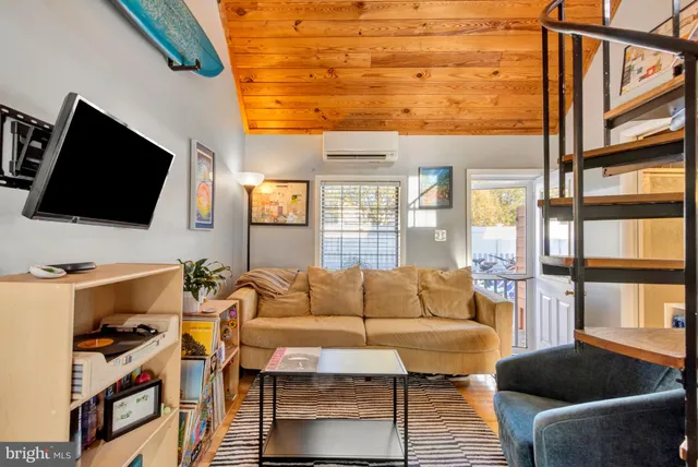 an ocean view with a swimming pool and wooden floor