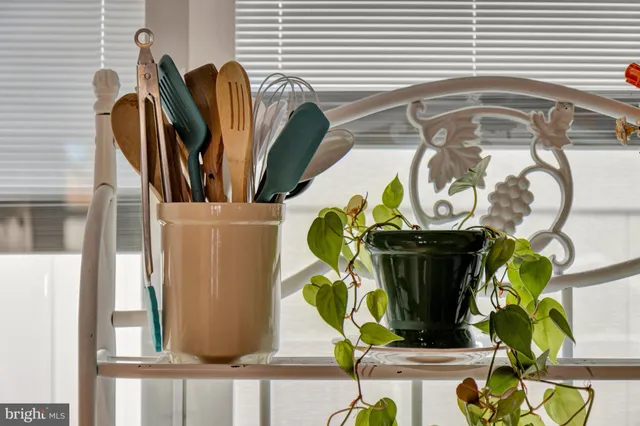 a view of a patio with a table and chairs