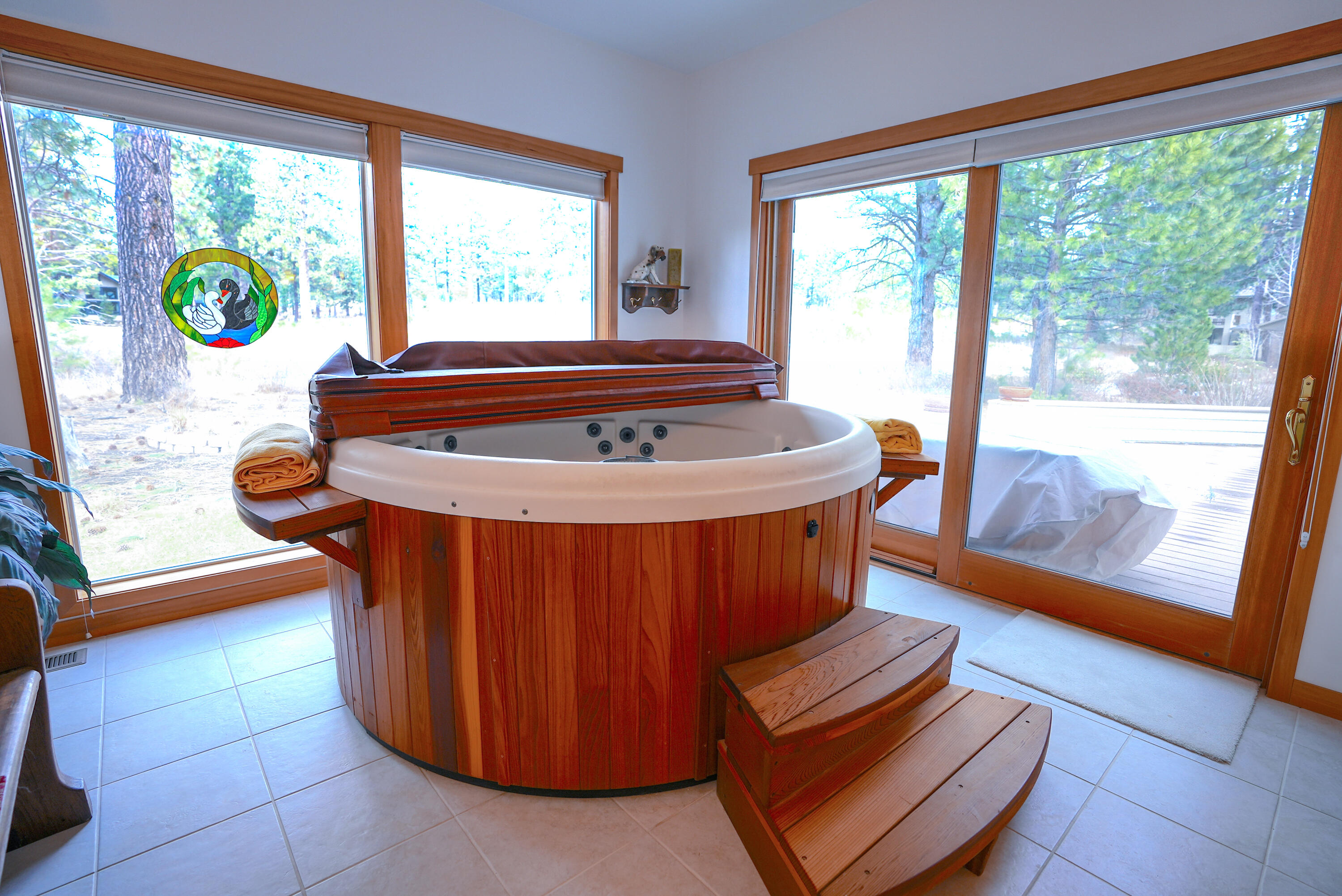 60709 Golf Village Loop Bend, OR 97702 - Photo 26 of 45 Nordic Spa room with lots of windows to the out or doors