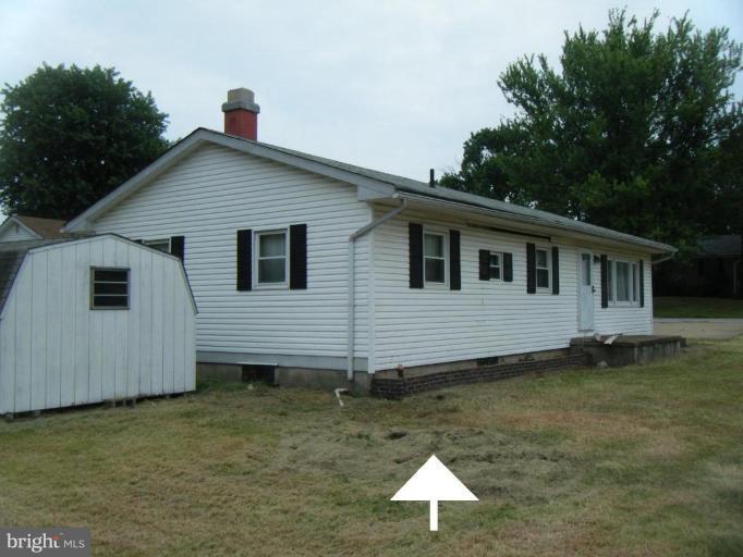 7922 Shore Road Sparrows Point, MD 21219 - Photo 2 of 8 a view of a house with a yard