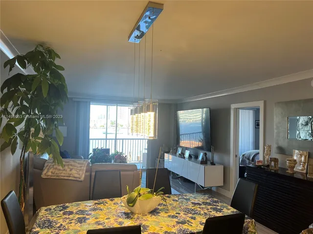 a bedroom with a bed and a dresser in it