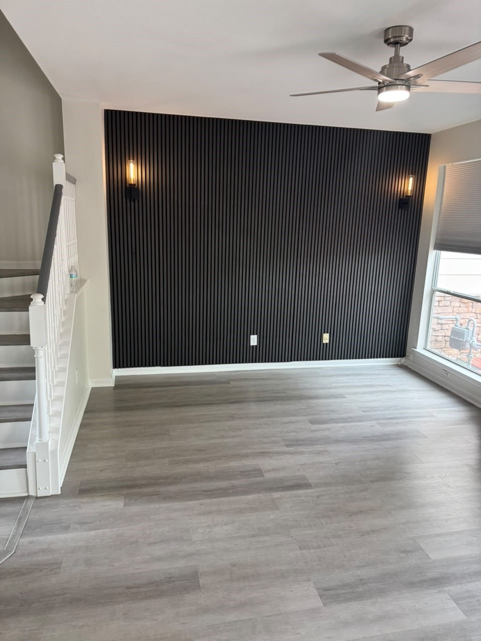 2110 Ridge Wood Lane Sugar Land, TX 77479 - Photo 7 of 23 a view of an empty room with wooden floor and stairs