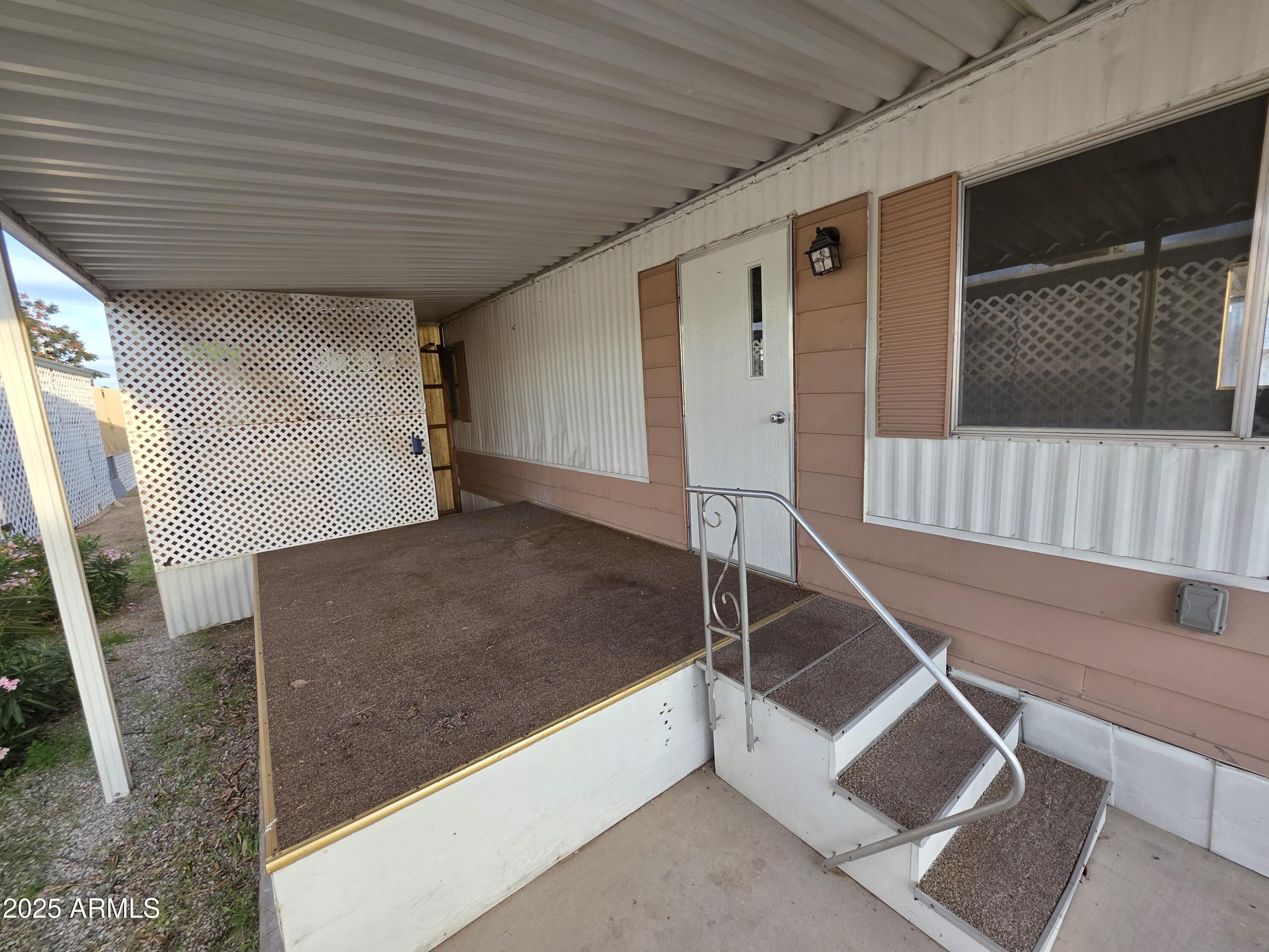 4800 West Ocotillo Road, Unit 105 Glendale, AZ 85301 - Photo 18 of 20 a front view of a house with stairs