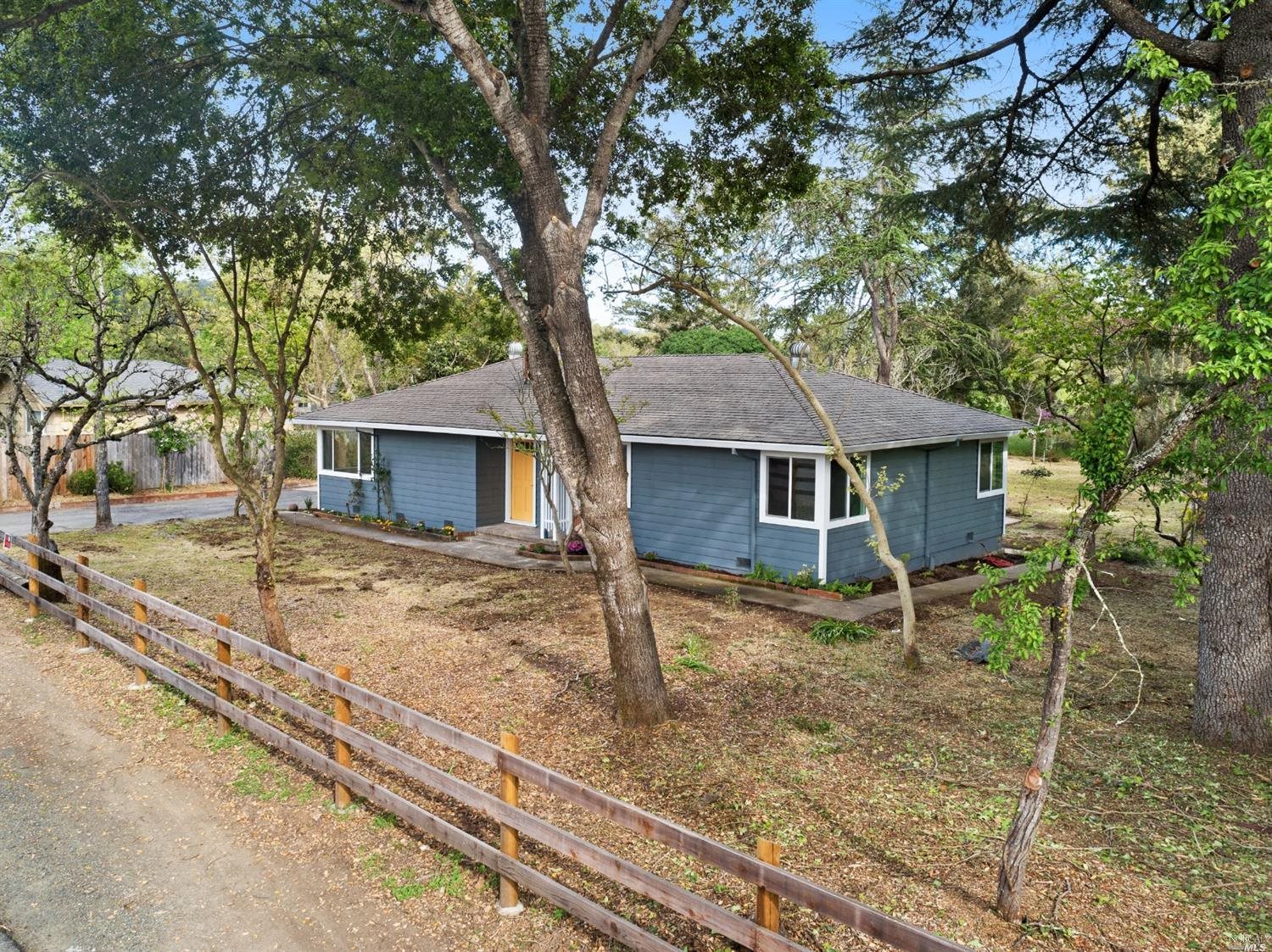 6120 Melita Road Santa Rosa, CA 95409 - Photo 1 of 1 front view of a house with a yard
