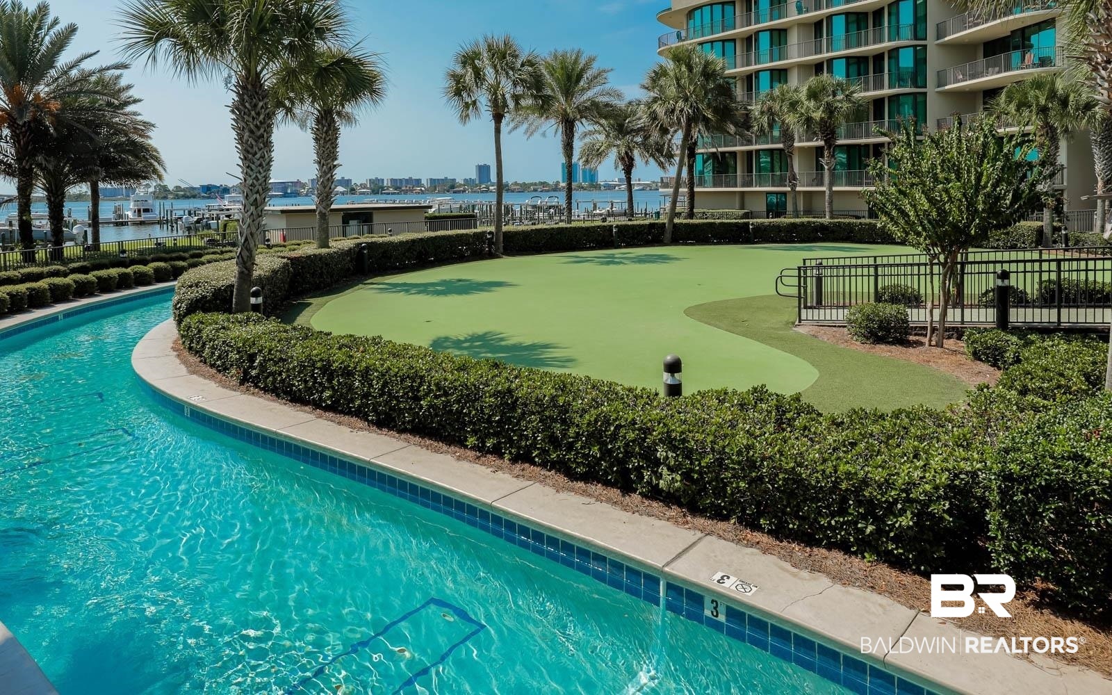 27580 Canal Road, Unit 1429 Orange Beach, AL 36561 - Photo 29 of 45 View of swimming pool featuring an area to practice putting