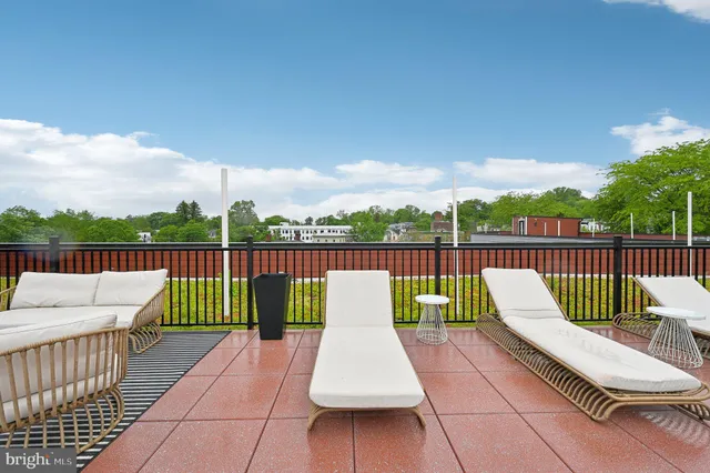 a view of deck with a flat screen tv