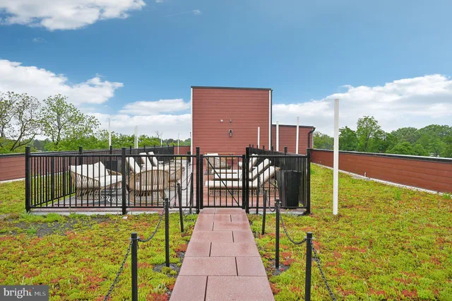 a view of a livingroom with wooden floor