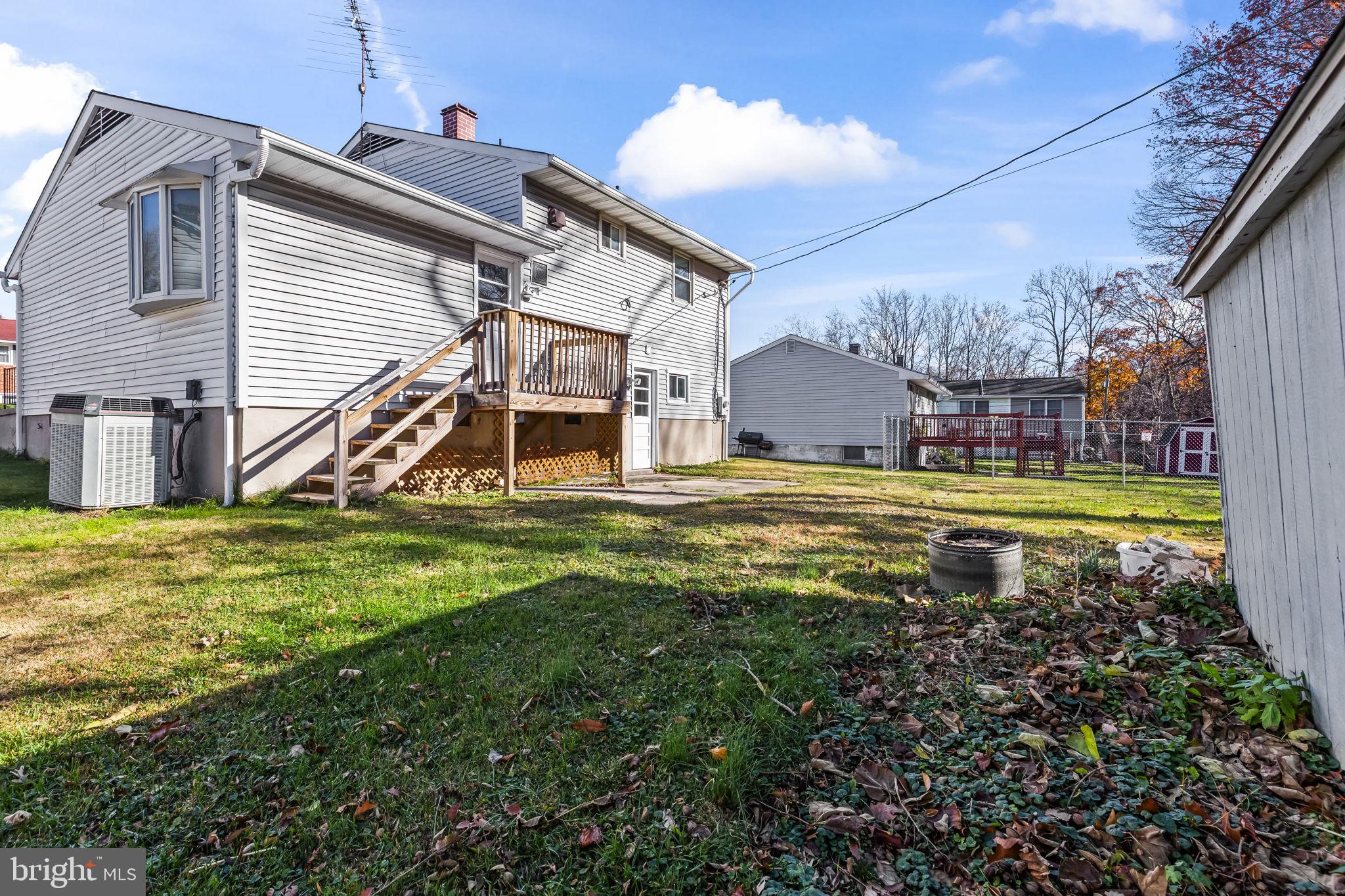 3407 Orbitan Road Parkville, MD 21234 - Photo 13 of 23 a view of a house with a swimming pool