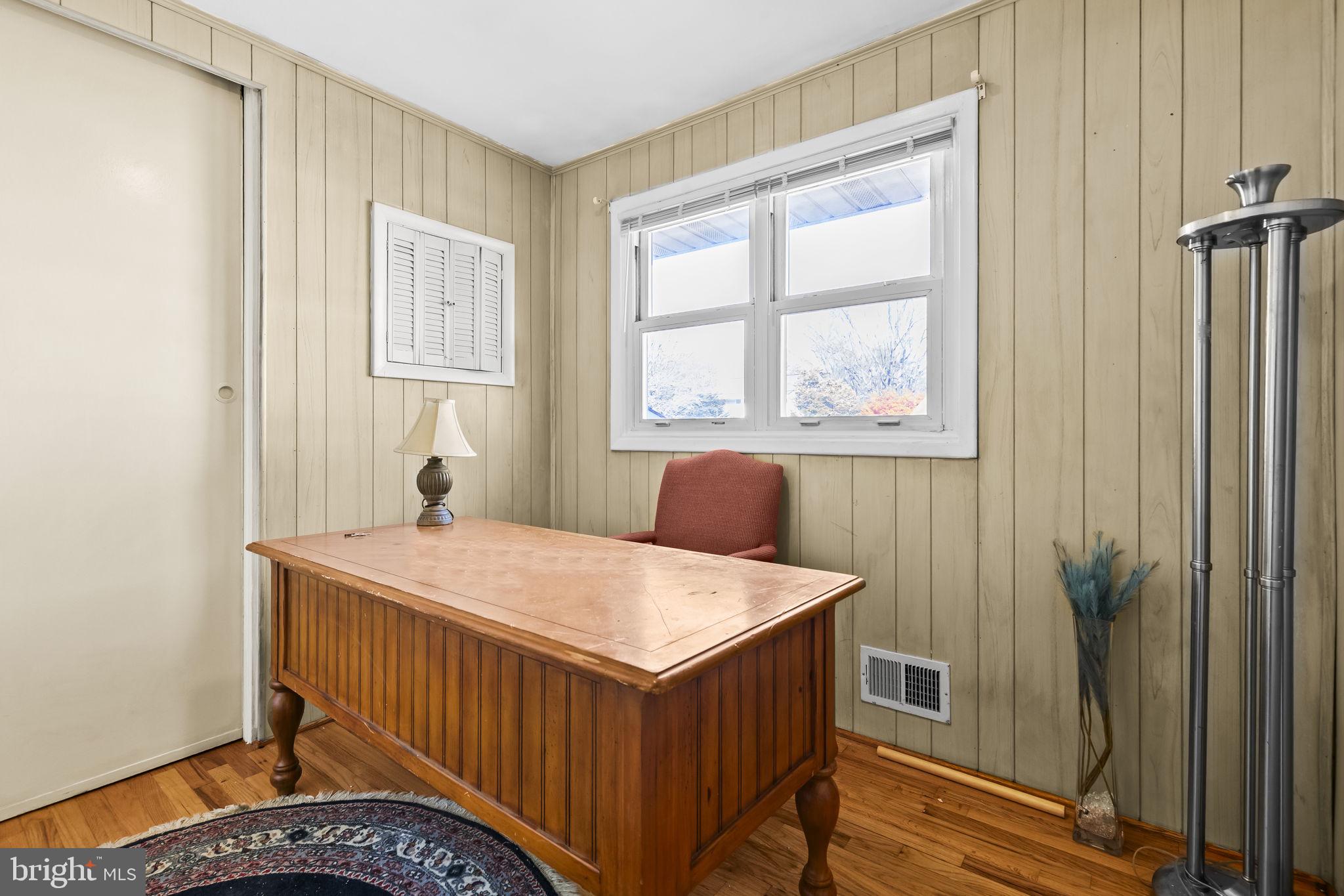 3407 Orbitan Road Parkville, MD 21234 - Photo 18 of 23 a bedroom with a bed and a window