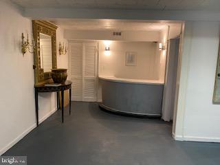 3407 Orbitan Road Parkville, MD 21234 - Photo 22 of 23 a view of a room with gym equipment